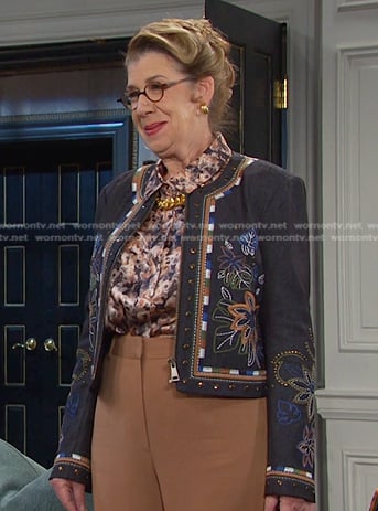 Rita's abstract print blouse and floral jacket on Days of our Lives