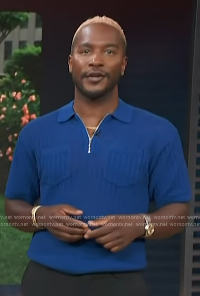 Scott's blue knit polo shirt on Access Hollywood
