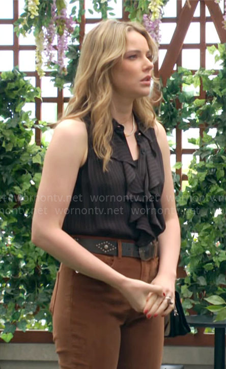 Tessa's pinstripe ruffled shirt on The Young and the Restless