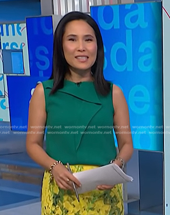 Vicky's green ruffled sleeveless top on NBC News Daily