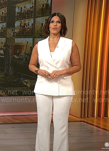 Dana Jacobson's white vest and pants on CBS Mornings