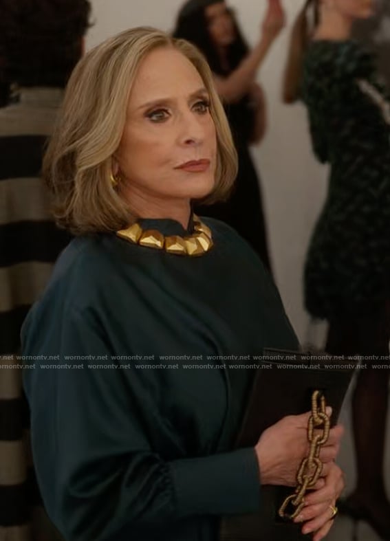 Gia's black clutch bag on And Just Like That