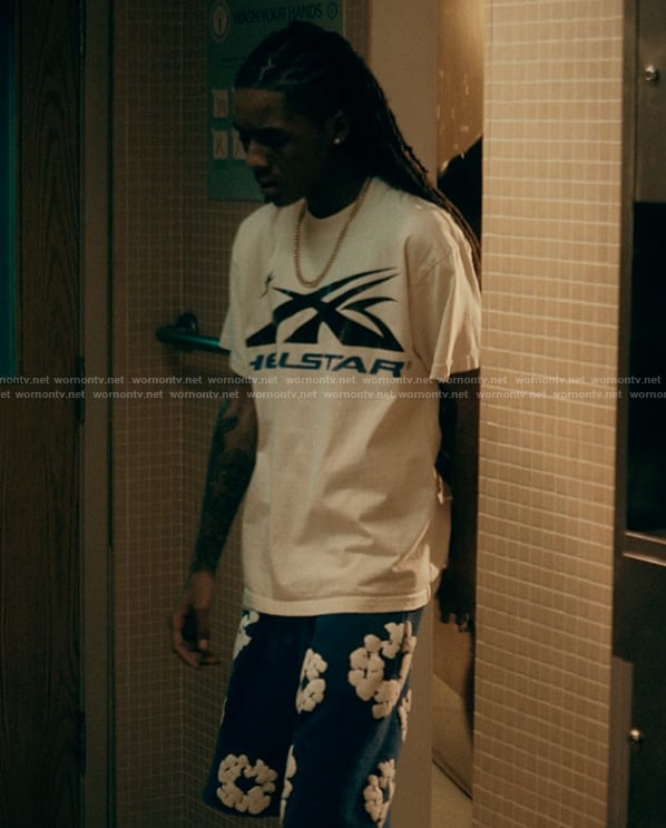 Jake's blue floral shorts on The Chi