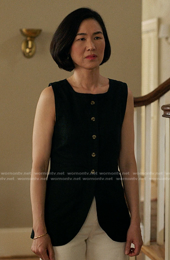 Laure's black vest on The Summer I Turned Pretty