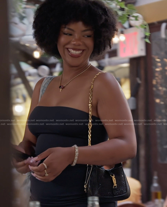 Riley's black and gold bag on Next Gen NYC