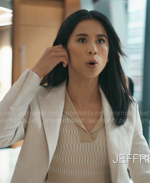 Sarah's beige printed polo top on Matlock