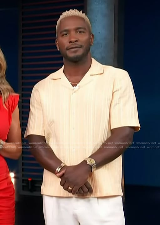 Scott's yellow knit shirt on Access Hollywood