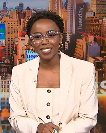 Zinhle's beige strapless vest and blazer on NBC News Daily
