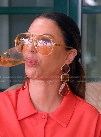 Adriana's pilot sunglasses and earrings on The Real Housewives of Miami