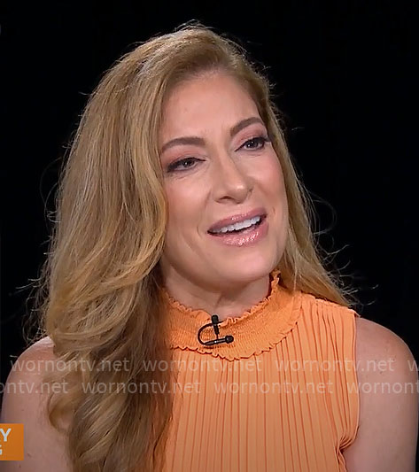 Debra Alfarone's orange pleated dress on CBS Mornings