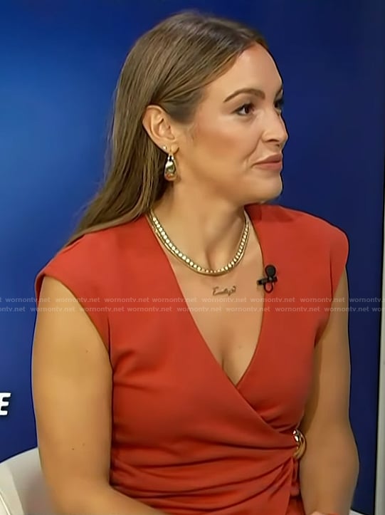 Emily's red wrap top on Access Hollywood