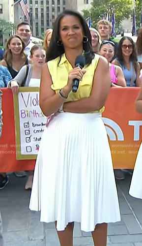 Laura's yellow sleeveless shirt and white pleated skirt on Today