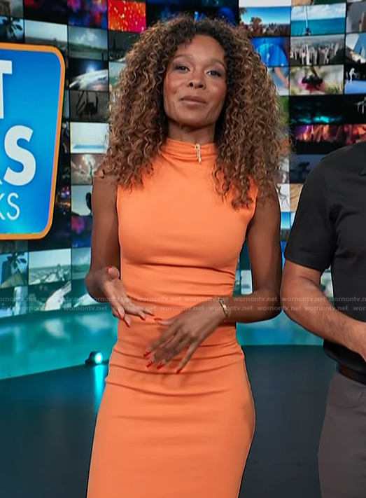 Zuri's orange ruched side dress on Access Hollywood