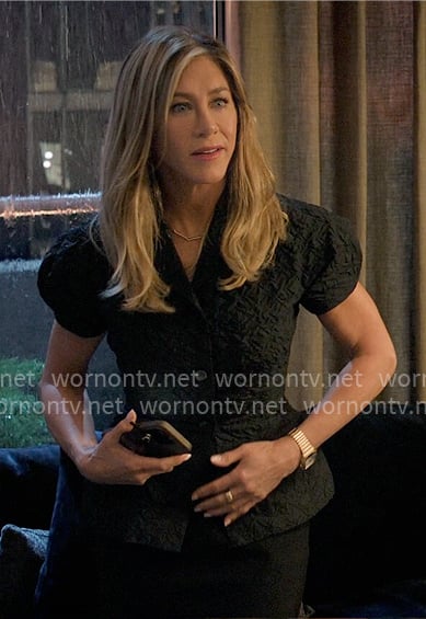 Alex's black textured short-sleeve jacket on The Morning Show