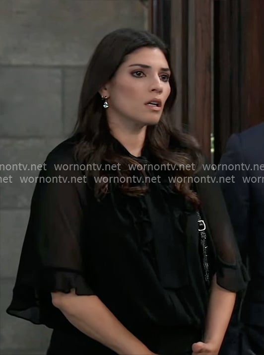 Brook Lynn's black ruffled blouse on General Hospital
