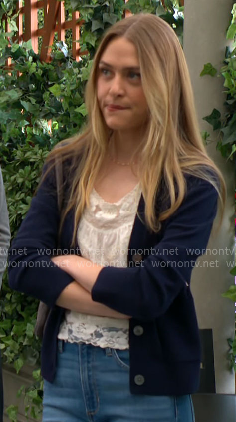 Claire's white lace top and navy blue cardigan on The Young and the Restless