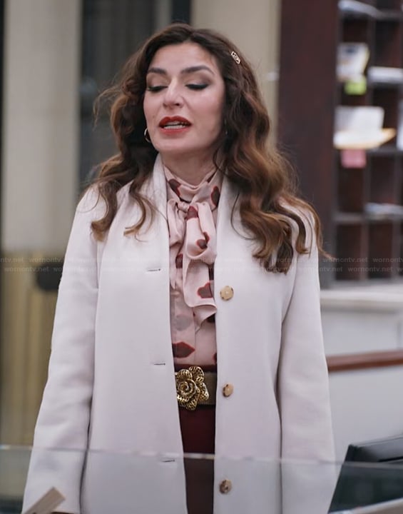 Esmerelda's pink printed tie neck blouse on The Paper