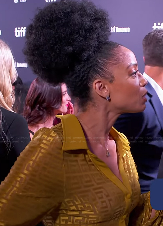 Francesca's yellow monogram jumpsuit on E! News