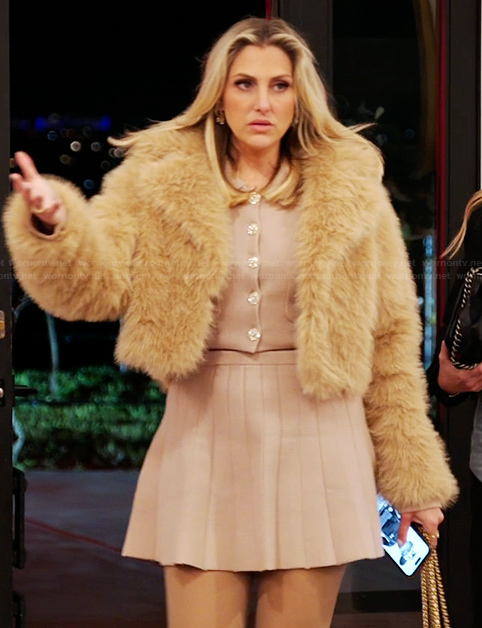 Gina's pink cardigan and mini skirt on The Real Housewives of Orange County