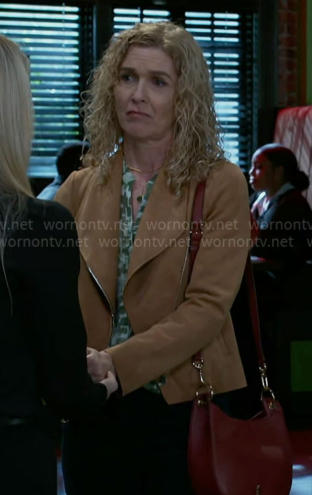Jan's green printed top and suede jacket on Beyond the Gates