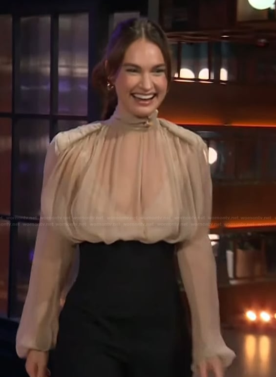 Lily James's sheer top and high waist pants on The Kelly Clarkson Show