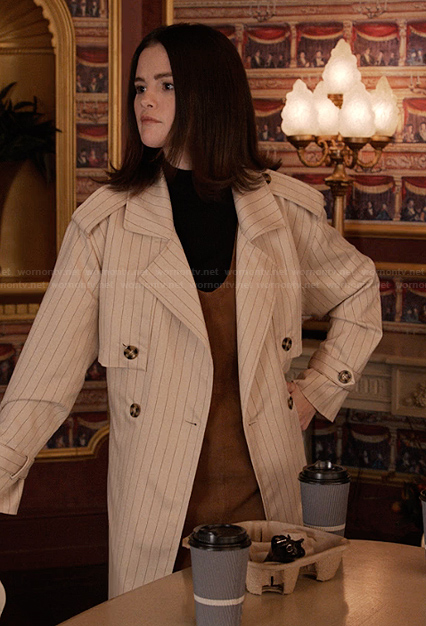 Mabel's white pinstripe coat on Only Murders in the Building