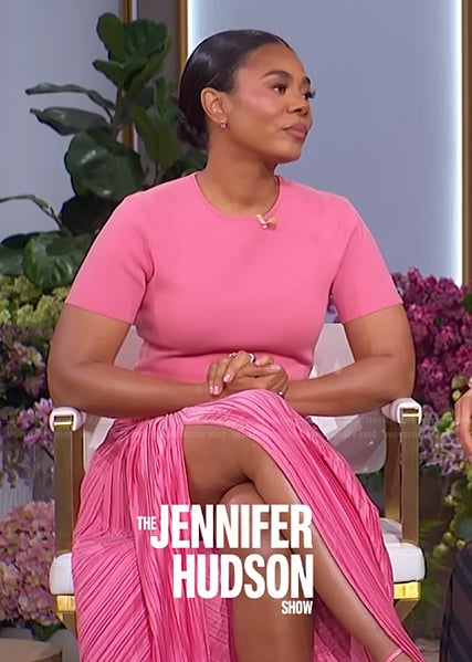 Regina's pink tee and pleated skirt on The Jennifer Hudson Show