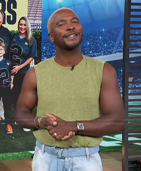 Scott's knit vest and jeans on Access Hollywood