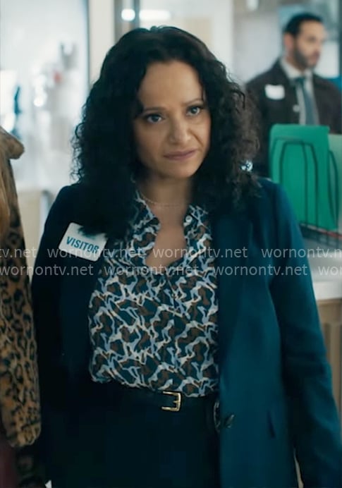 Selena's printed button down blouse on High Potential