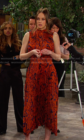 Stephanie's orange printed pleated dress on Days of our Lives