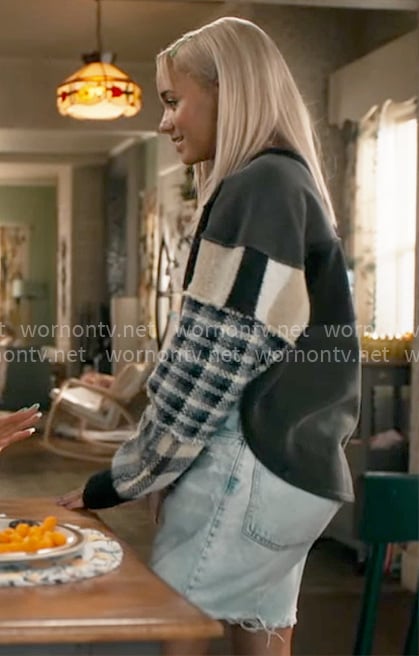 Ava's patchwork sleeve sweater on High Potential