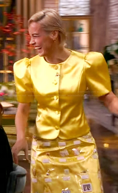 Brie Larson's yellow satin top and skirt on The View