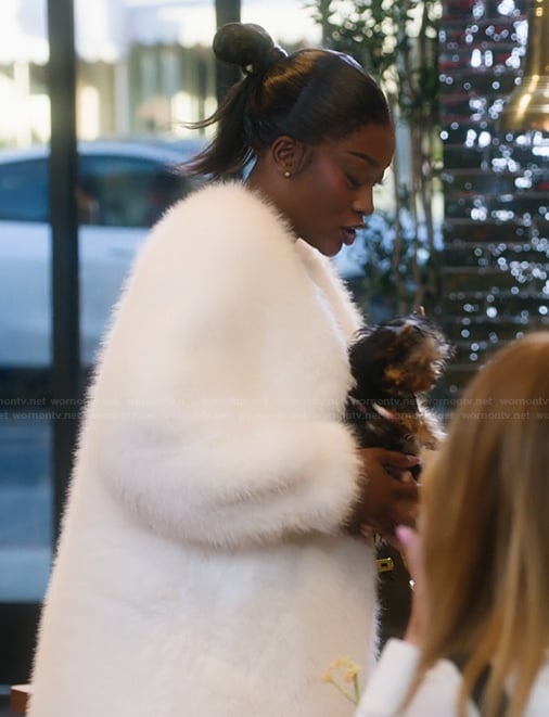 Chelsea's white fur coat on Selling Sunset