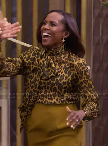 Deborah Roberts's leopard print tie neck blouse on Live with Kelly and Mark