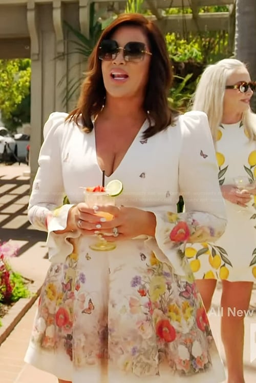 Emily's white floral print v-neck dress on The Real Housewives of Orange County