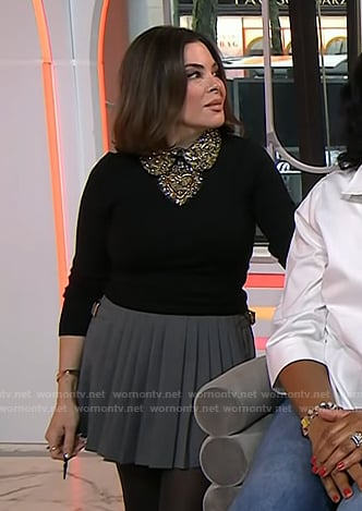 Erica Taylor's black embellished sweater and grey pleated skirt on Today