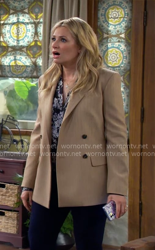 Gemma's black and white floral blouse on The Neighborhood