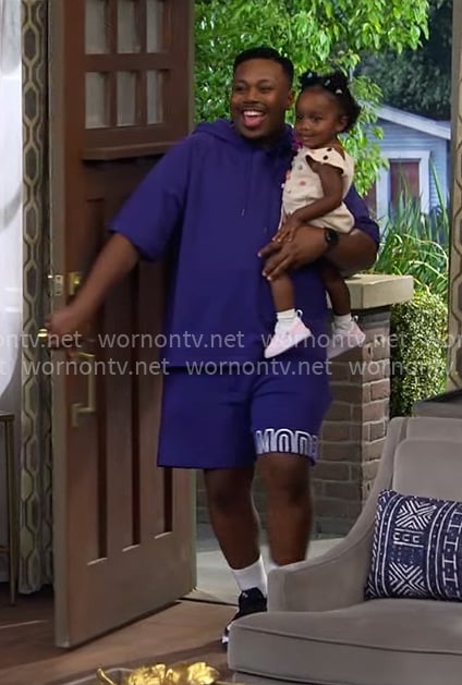 Marty's purple sweatshirt and shorts set on The Neighborhood