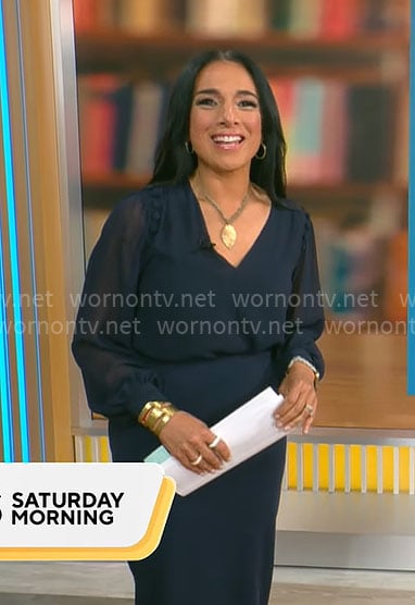Michelle Miller's navy blue v-neck blouse on CBS Mornings
