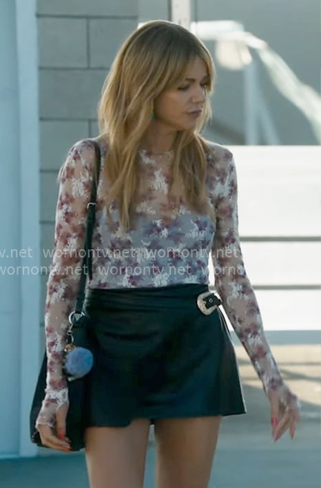 Morgan's white floral mesh top and leather wrap skirt on High Potential