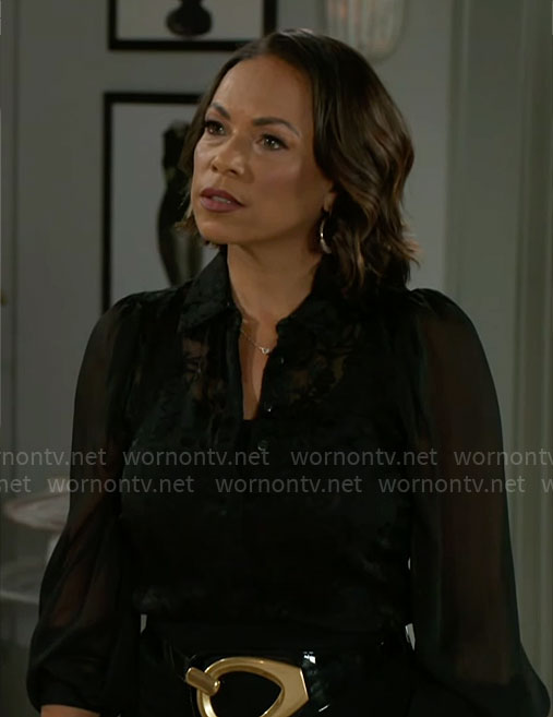 Nicole's black embroidered blouse and ruffle hem skirt on Beyond the Gates