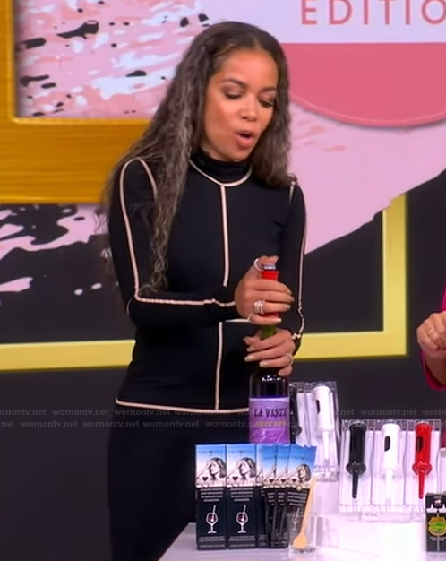 Sunny's black contrast stripe turtleneck dress on The View