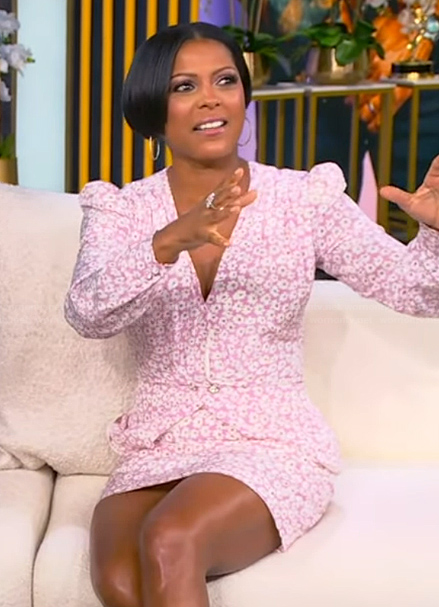Tamron's pink floral print mini dress on Tamron Hall Show