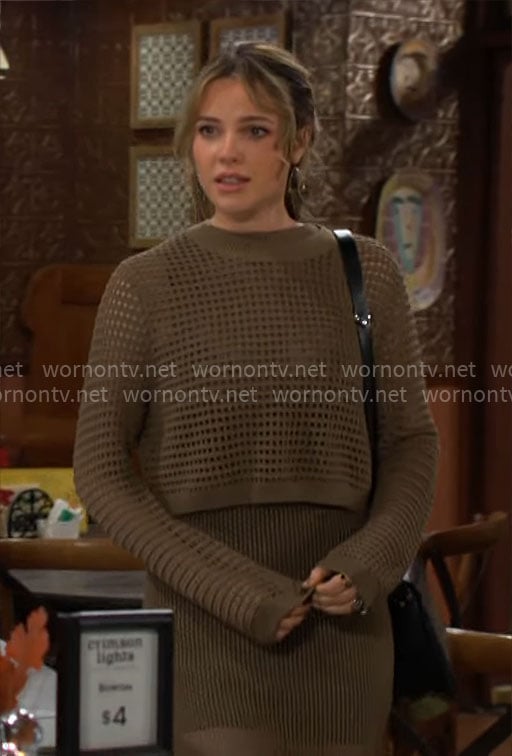 Tessa's green knit sweater on The Young and the Restless