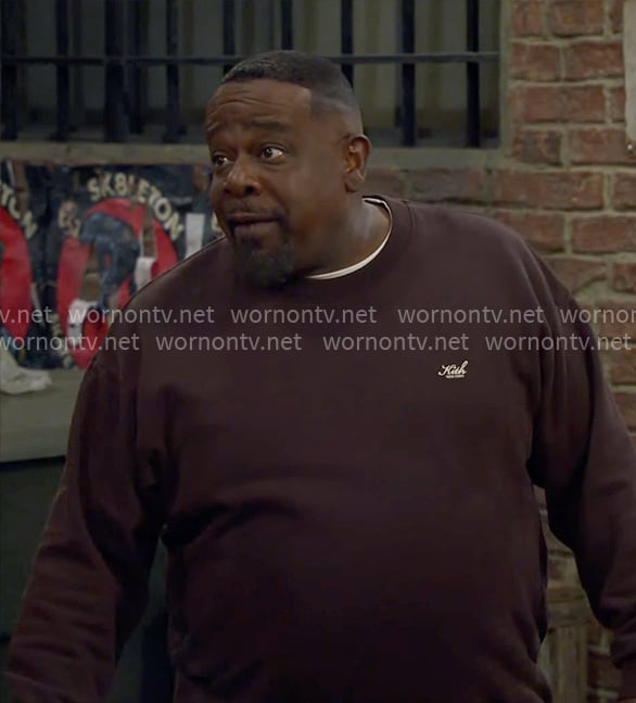 Calvin's brown Kith sweater on The Neighborhood