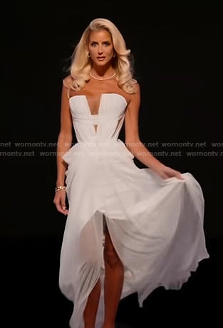 Emma's white strapless reunion gown on Selling Sunset