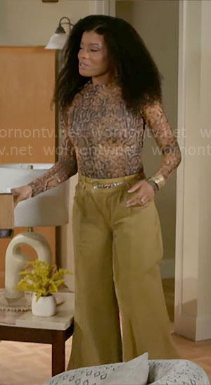 Eva's snake print mesh top and wide leg yellow jeans on Beyond the Gates