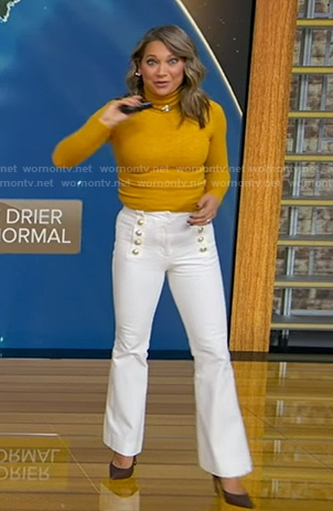 Ginger's yellow turtleneck and white flare pants on Good Morning America