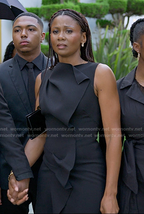 Jax's black sleeveless ruffle dress on Reasonable Doubt