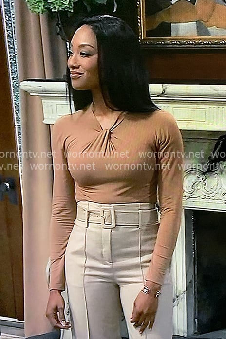 Jordan's twist neck top and belted pants on General Hospital